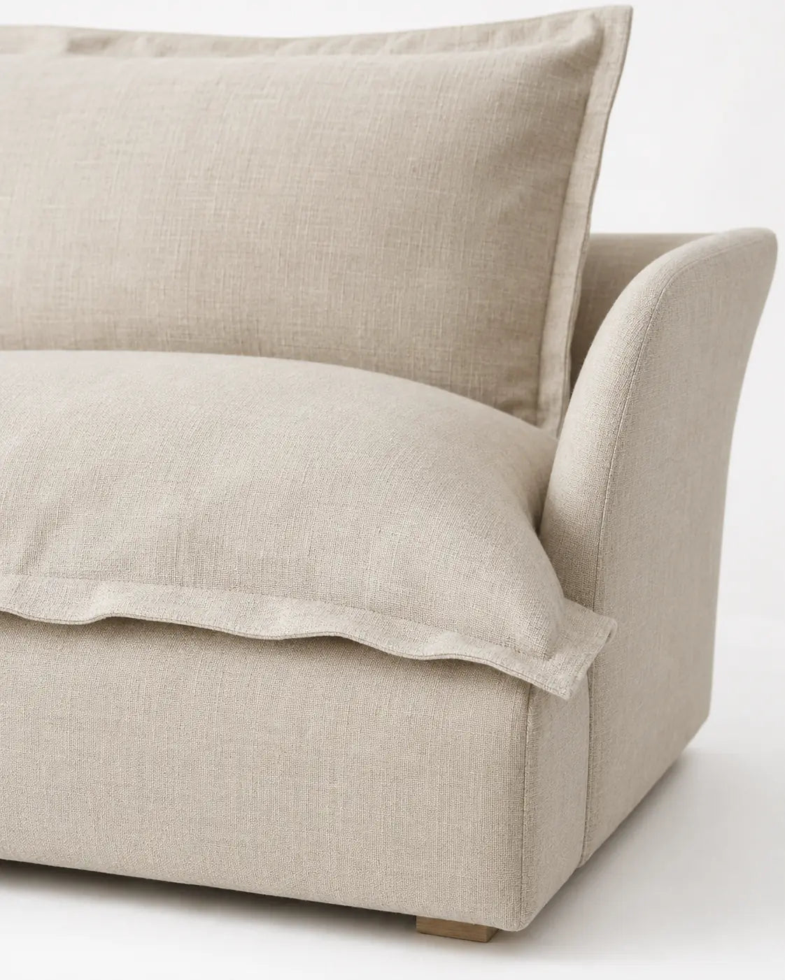 Avela three-seater sofa linen cushion seam and arm detail